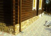 Как облицевать бетонный цоколь искусственным камнем